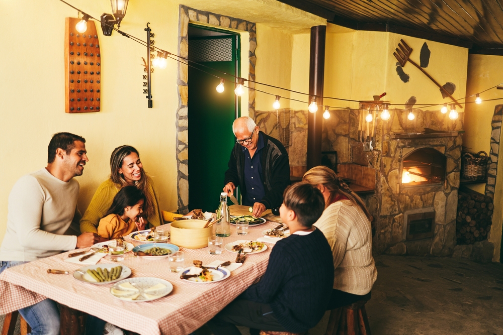 Happy,Latin,Family,Cooking,Together,During,Dinner,Time,At,Home